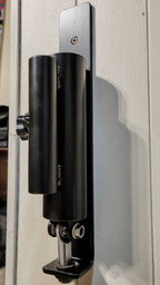 Wall Mounted Landmine base attached to wall, compatible with 1" and 2" barbells for versatile strength training