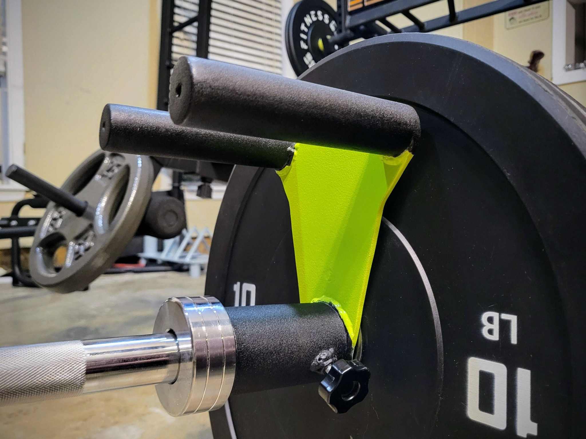 Narrow Grip V-Row Handle for Olympic barbell with rugged coating and compact design for landmine workouts targeting upper back and lats