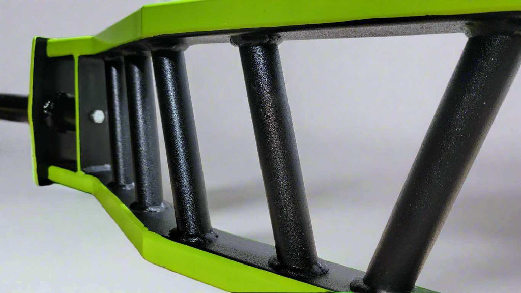 Detail view of cambered barbell’s multi-grip section with textured black handles and neon green frame for enhanced grip variety.