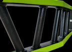 Detail view of cambered barbell’s multi-grip section with textured black handles and neon green frame for enhanced grip variety.