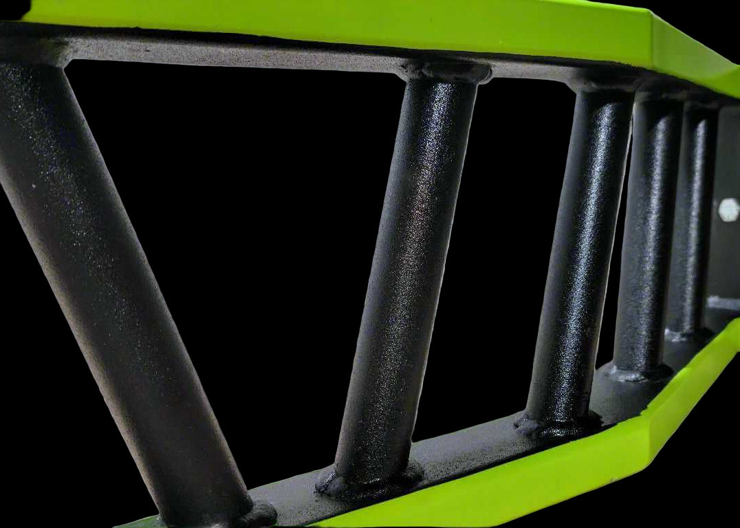 Detail view of cambered barbell’s multi-grip section with textured black handles and neon green frame for enhanced grip variety.