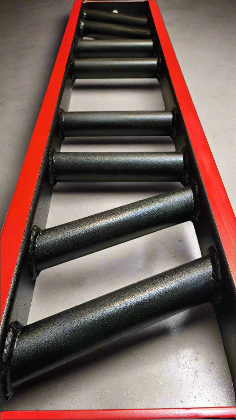 Detailed view of BMF Swiss Barbell's textured black grips and welded joints. Designed for durability and ergonomic strength training.