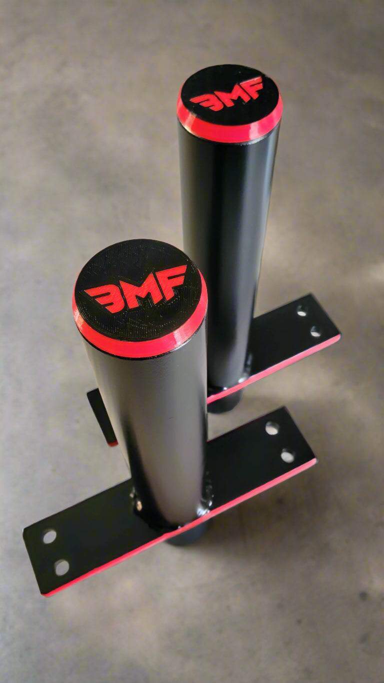Pair of BMF Swiss Barbell sleeves with red accents and logo. Precision-crafted for secure weight loading and barbell customization.