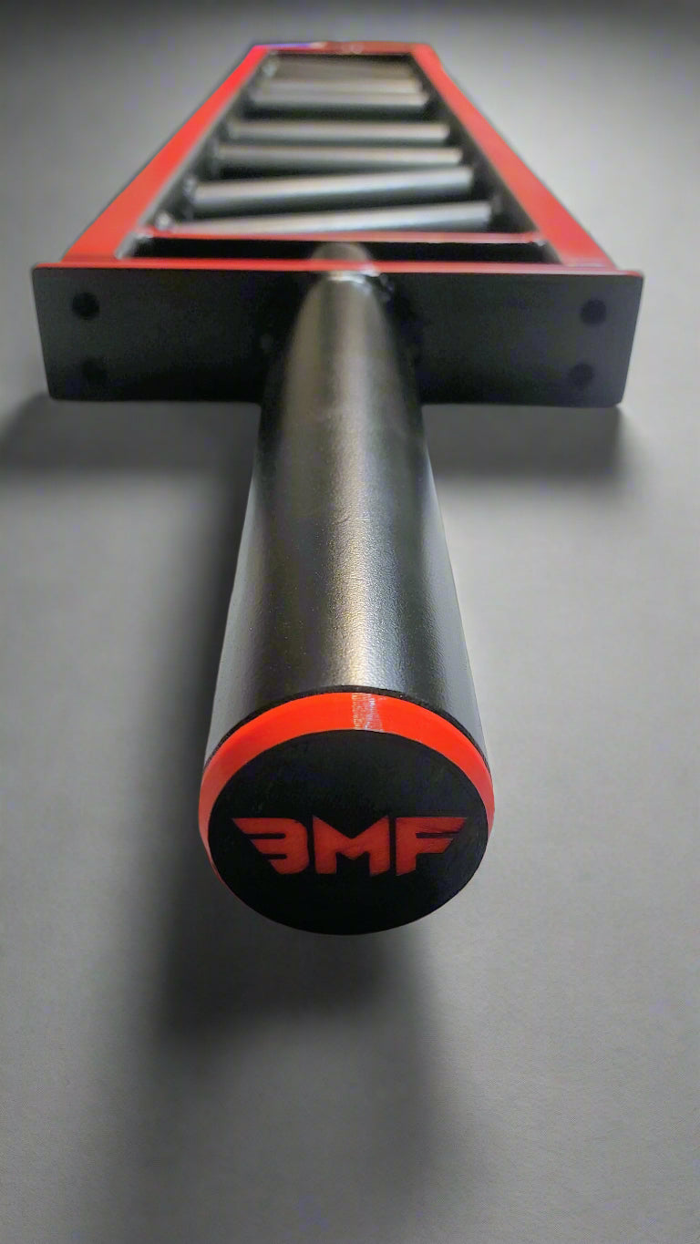 Close-up of BMF Multi-Grip Swiss Barbell end cap featuring red and black branding. Durable design for serious lifters and customizable workouts.